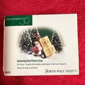 Department 56 North Pole Series Snow Delivery with Red and White Accents